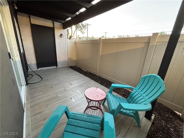 view of patio / terrace with fence
