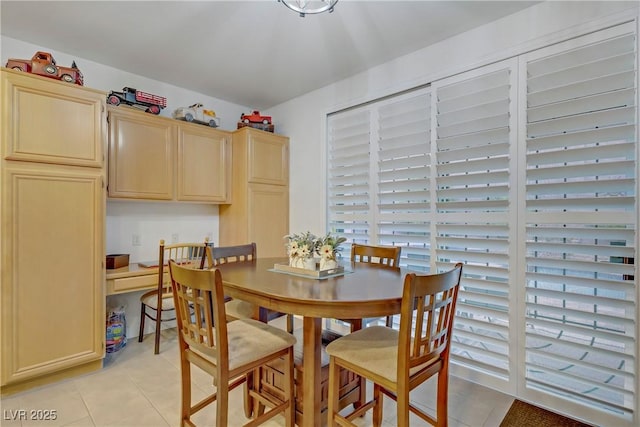 7013 Bisoni St, Las Vegas, NV 89149 - dining room featuring light tile patterned flooring