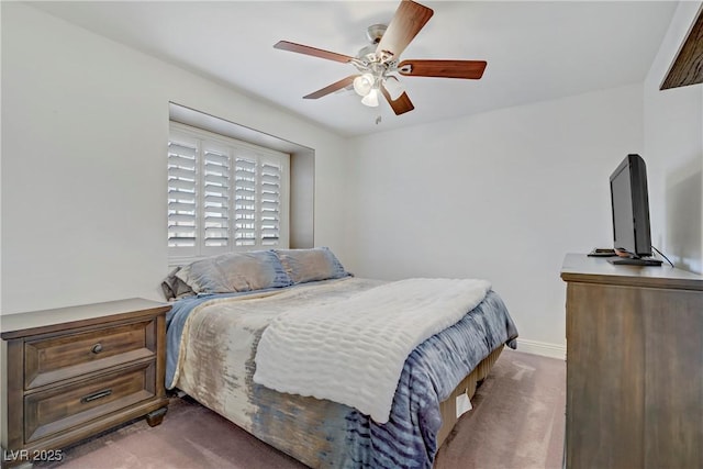 7013 Bisoni St, Las Vegas, NV 89149 - carpeted bedroom featuring a ceiling fan and baseboards