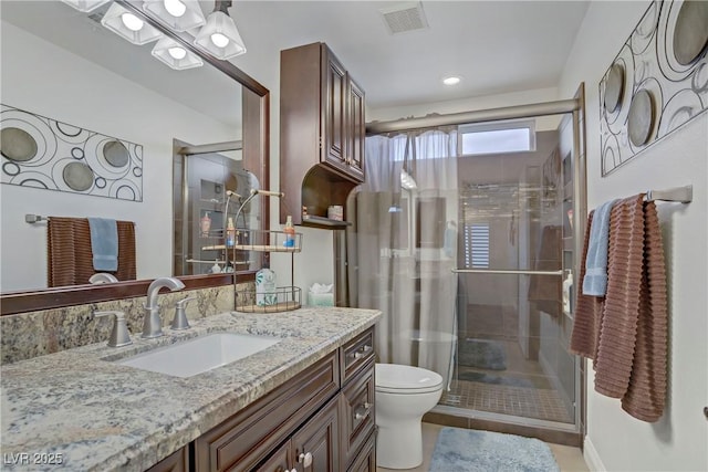 7013 Bisoni St, Las Vegas, NV 89149 - bathroom featuring a stall shower, toilet, and vanity