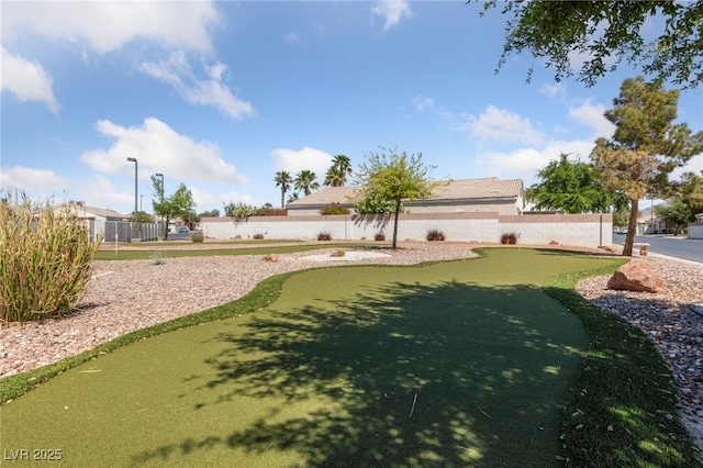 surrounding community featuring fence