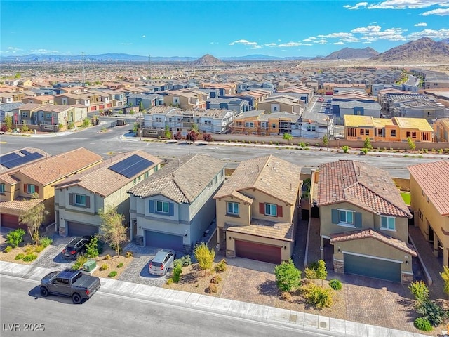 birds eye view of property featuring a residential view and a mountain view