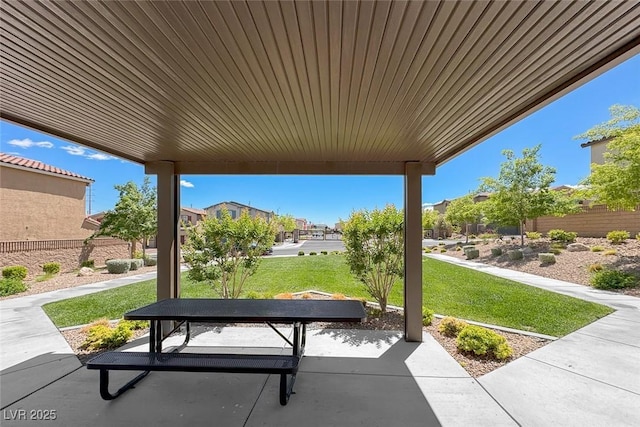 view of patio / terrace featuring fence