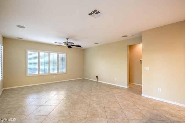 spare room with visible vents, baseboards, ceiling fan, and light tile patterned flooring