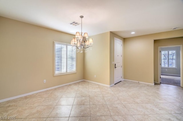 empty room with visible vents, baseboards, a notable chandelier, recessed lighting, and light tile patterned flooring