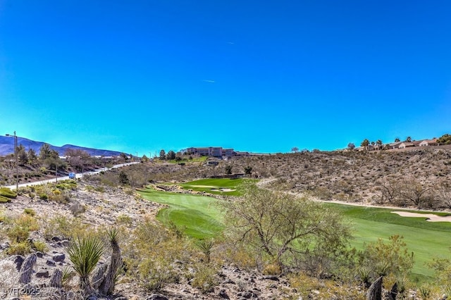 view of mountain feature with view of golf course