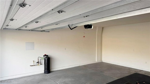 361 Andy Wheeler Dr, Henderson, NV 89011 - garage with baseboards and a garage door opener