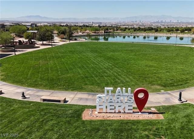 361 Andy Wheeler Dr, Henderson, NV 89011 - surrounding community with a water view and a lawn
