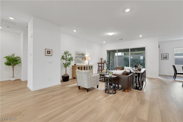712 Webber Park St, Henderson, NV 89011 - living room with light wood-style floors, recessed lighting, and visible vents