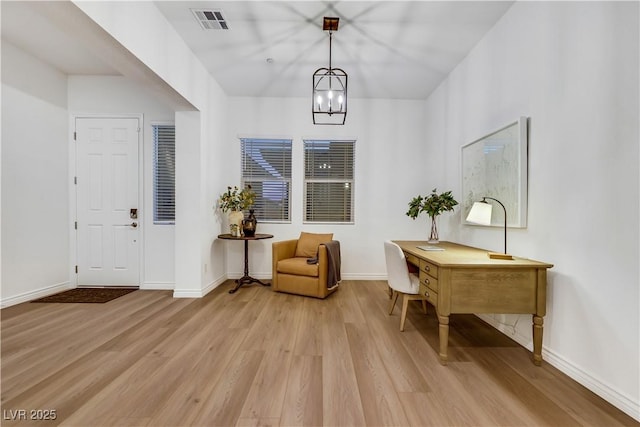 712 Webber Park St, Henderson, NV 89011 - living area featuring a chandelier, baseboards, visible vents, and light wood-style floors