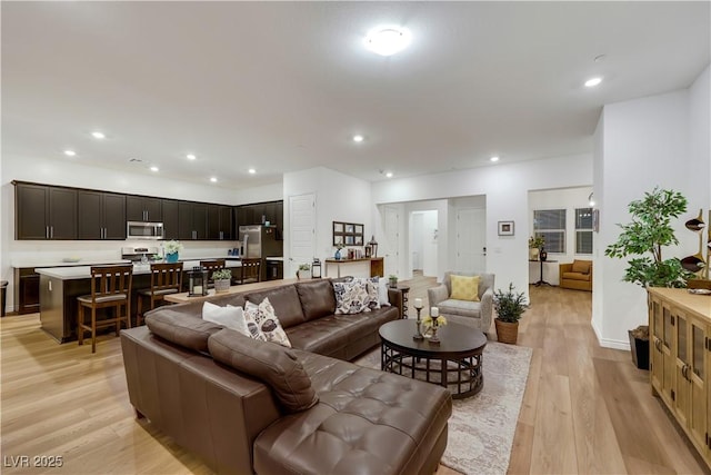 712 Webber Park St, Henderson, NV 89011 - living room featuring light wood-style floors and recessed lighting