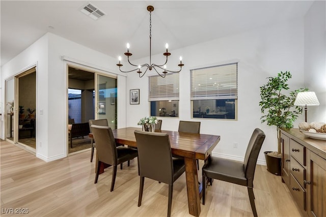 712 Webber Park St, Henderson, NV 89011 - dining area with baseboards, a notable chandelier, light wood-style flooring, and visible vents