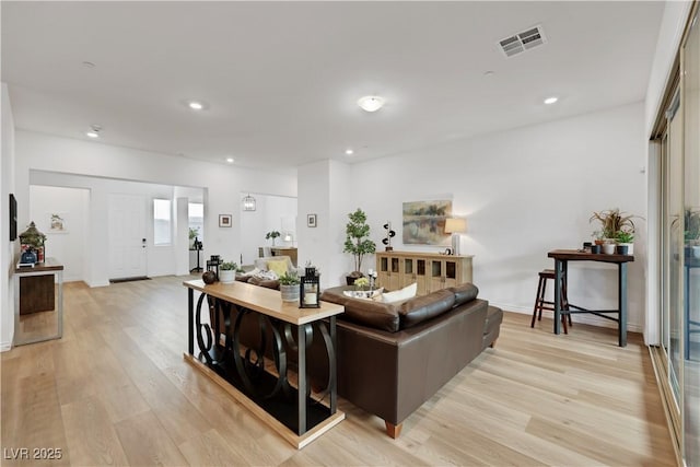 712 Webber Park St, Henderson, NV 89011 - living room with visible vents, recessed lighting, and light wood finished floors