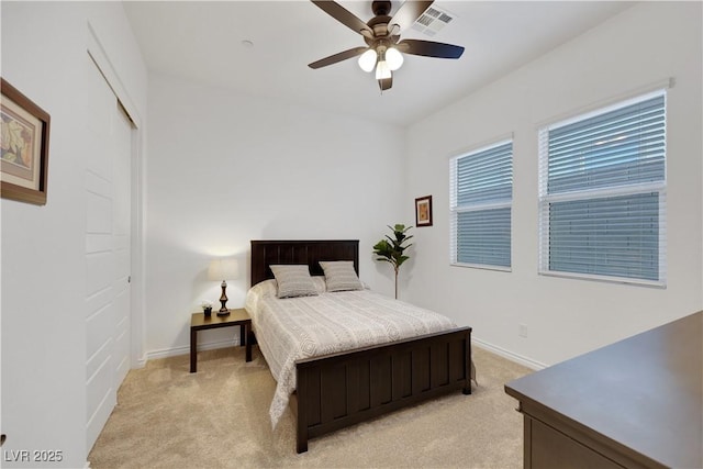 712 Webber Park St, Henderson, NV 89011 - bedroom with baseboards, light colored carpet, and visible vents