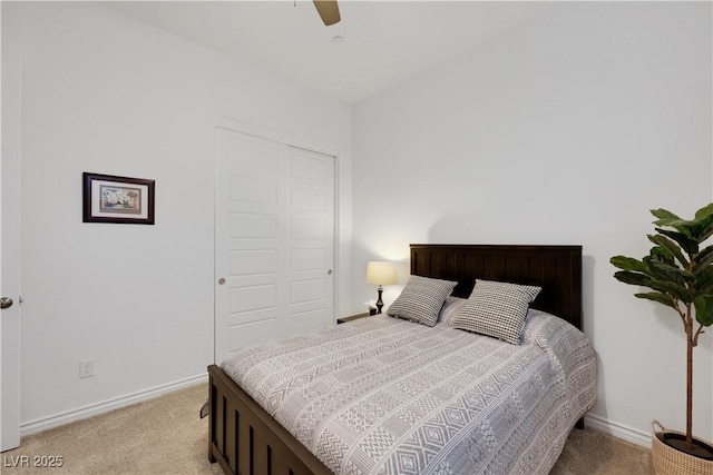 712 Webber Park St, Henderson, NV 89011 - bedroom featuring a ceiling fan, baseboards, light carpet, and a closet