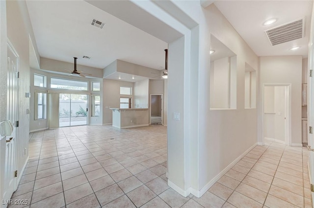 8052 Marbella Cir, Las Vegas, NV 89128 - hall with light tile patterned flooring, baseboards, and recessed lighting