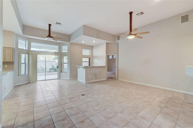 8052 Marbella Cir, Las Vegas, NV 89128 - unfurnished living room with a ceiling fan, light tile patterned flooring, baseboards, and recessed lighting