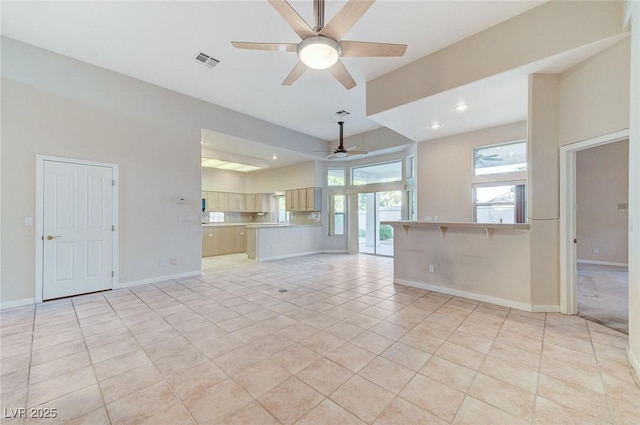 8052 Marbella Cir, Las Vegas, NV 89128 - unfurnished living room featuring ceiling fan, baseboards, recessed lighting, and light tile patterned flooring