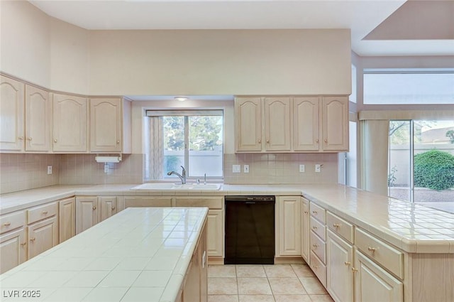 8052 Marbella Cir, Las Vegas, NV 89128 - kitchen with dishwasher, a sink, tile counters, and light tile patterned floors