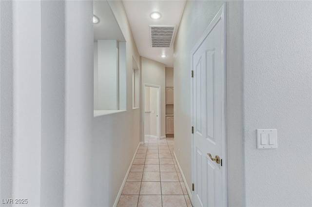 8052 Marbella Cir, Las Vegas, NV 89128 - hallway featuring light tile patterned floors, baseboards, and recessed lighting