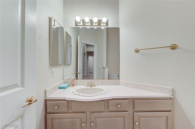 8052 Marbella Cir, Las Vegas, NV 89128 - bathroom featuring vanity and toilet