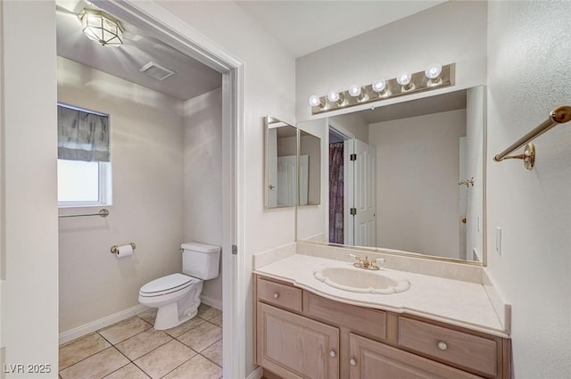 8052 Marbella Cir, Las Vegas, NV 89128 - bathroom with toilet, vanity, tile patterned flooring, and baseboards