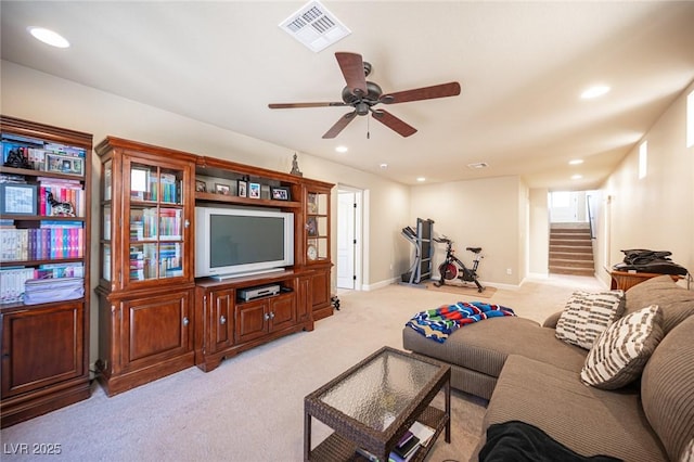 living room with ceiling fan, light carpet, stairs, recessed lighting, and visible vents