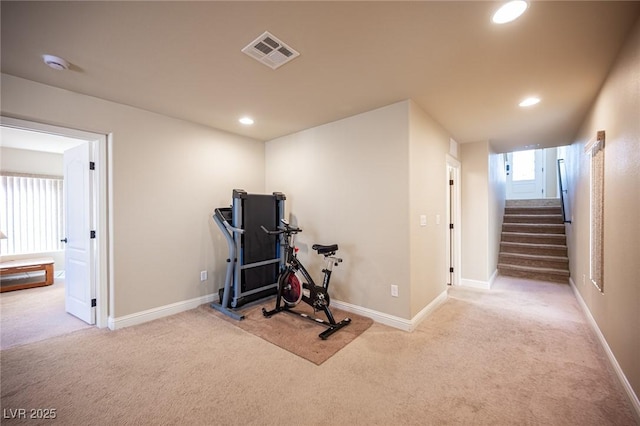 exercise area featuring carpet flooring, recessed lighting, baseboards, and visible vents