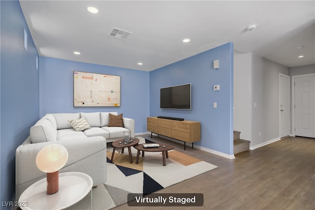 9932 Keephills St, Las Vegas, NV 89183 - living room featuring baseboards, recessed lighting, wood finished floors, and visible vents