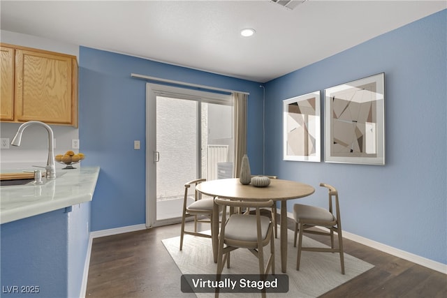 9932 Keephills St, Las Vegas, NV 89183 - dining room with recessed lighting, baseboards, and dark wood finished floors