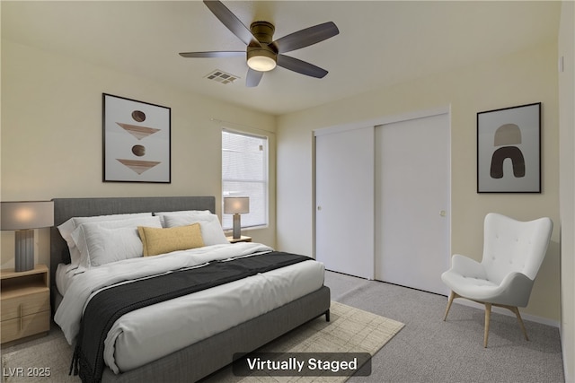 9932 Keephills St, Las Vegas, NV 89183 - bedroom featuring ceiling fan, visible vents, light carpet, and a closet