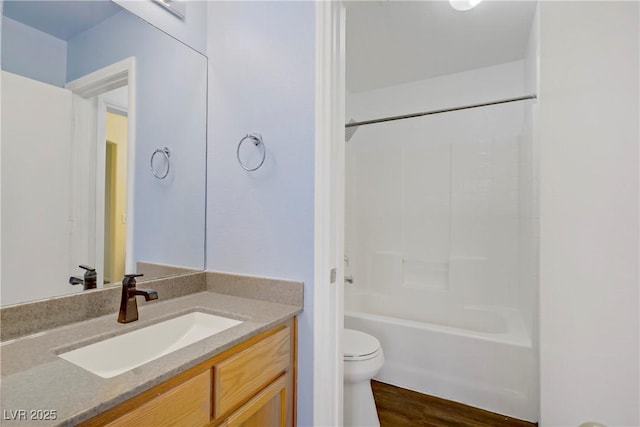 9932 Keephills St, Las Vegas, NV 89183 - full bath featuring vanity, wood finished floors, bathtub / shower combination, and toilet