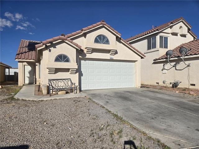 3512 Trilogy Dr, Las Vegas, NV 89108 - mediterranean / spanish house featuring an attached garage, stucco siding, roof mounted solar panels, concrete driveway, and a tiled roof