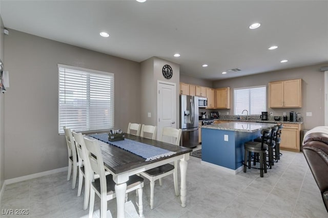 dining space with recessed lighting, baseboards, and visible vents