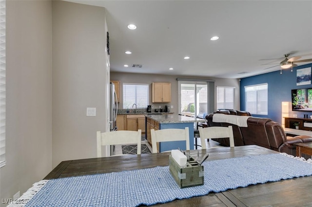 dining area featuring recessed lighting, ceiling fan, a healthy amount of sunlight, and visible vents