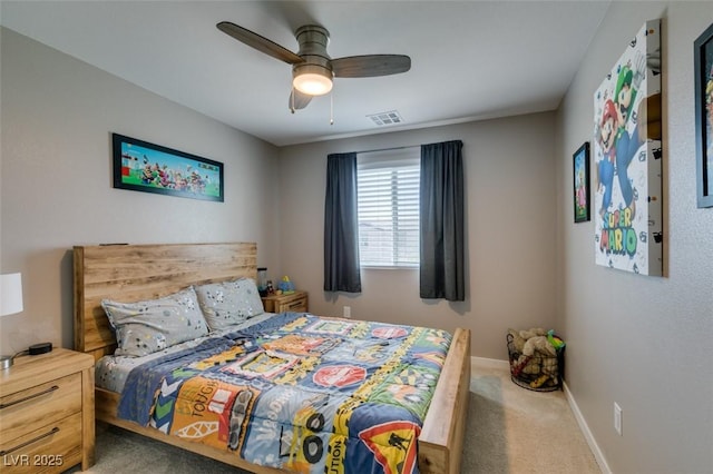 bedroom featuring visible vents, a ceiling fan, carpet, and baseboards