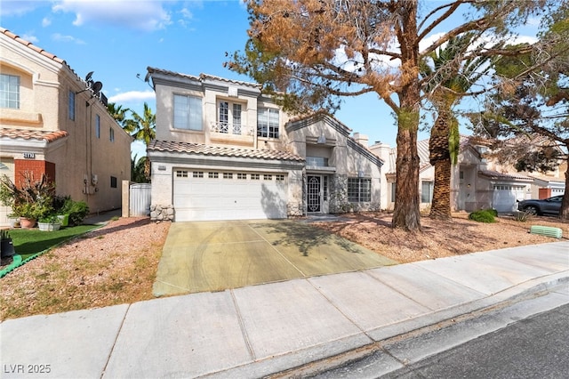 traditional home featuring a tile roof, a balcony, concrete driveway, an attached garage, and stucco siding