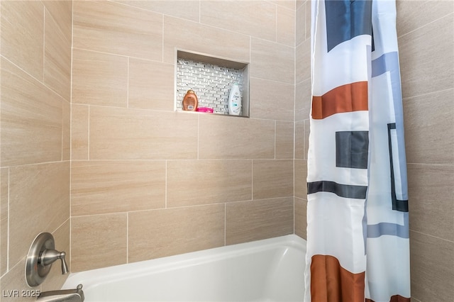 full bath with shower / bath combination with curtain