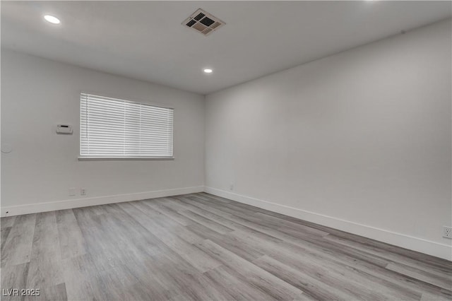 4432 Ash Ave, Las Vegas, NV 89110 - unfurnished room featuring wood finished floors, visible vents, baseboards, and recessed lighting