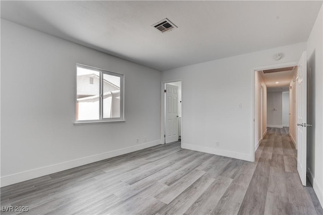 4432 Ash Ave, Las Vegas, NV 89110 - unfurnished bedroom with baseboards, visible vents, and light wood-style floors
