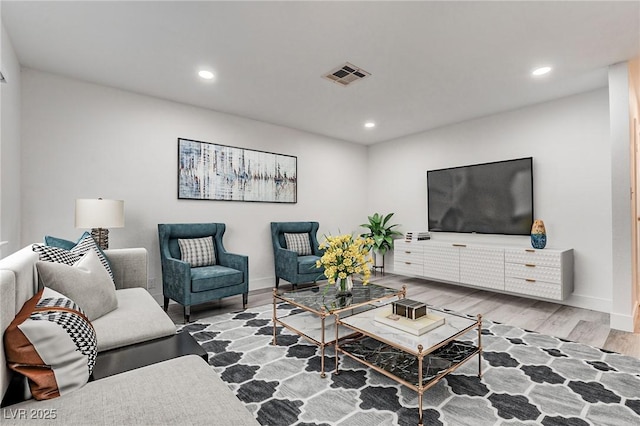 4432 Ash Ave, Las Vegas, NV 89110 - living room with recessed lighting, visible vents, and wood finished floors