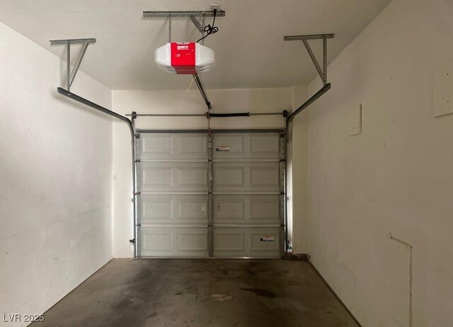 4941 Black Bear Rd Unit 202, Las Vegas, NV 89149 - garage featuring a garage door opener