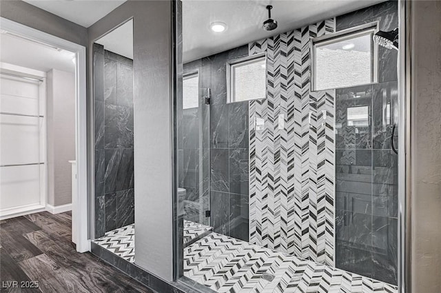 bathroom featuring a tile shower
