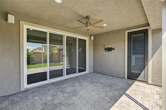 view of patio / terrace with a ceiling fan