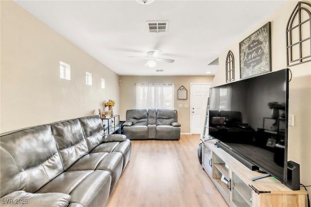 4195 Story Rock St, Las Vegas, NV 89115 - living area with ceiling fan, light wood-type flooring, and visible vents