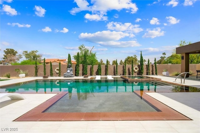 view of pool with an in ground hot tub, a fenced in pool, a fenced backyard, and a patio area