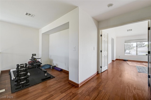 10519 Bella Camrosa Dr, Las Vegas, NV 89141 - exercise area featuring baseboards, wood finished floors, and visible vents