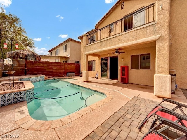 view of pool with a fenced backyard, a ceiling fan, a patio, and a fenced in pool