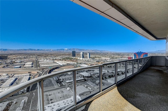 balcony featuring a mountain view