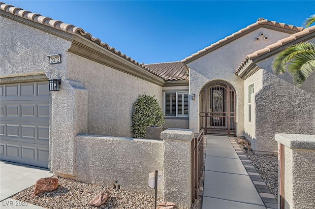 2372 Perrysburg Dr, Henderson, NV 89044 - entrance to property with stucco siding and a tile roof
